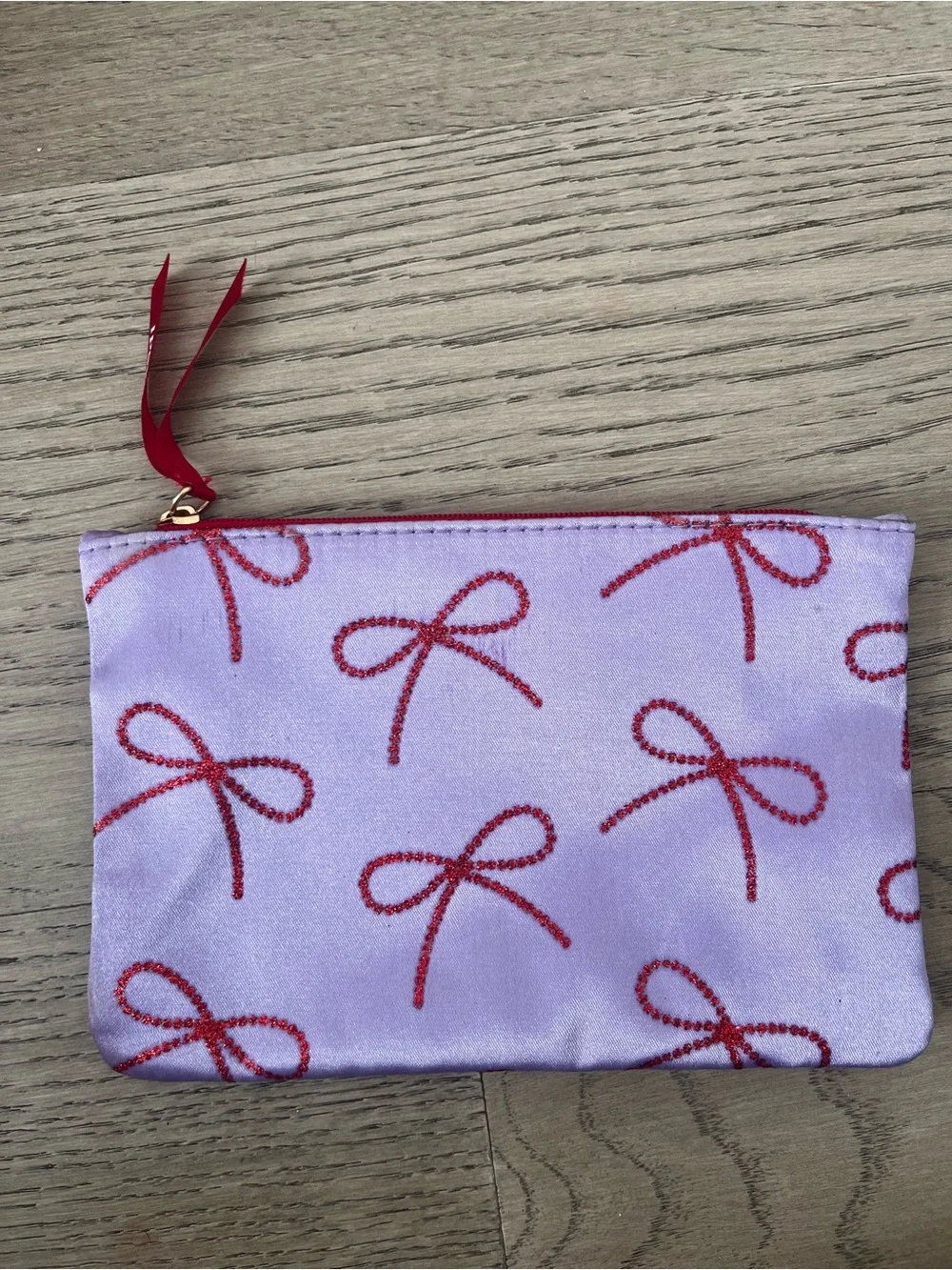 Lilac Satin Pouch with Red Bow Print